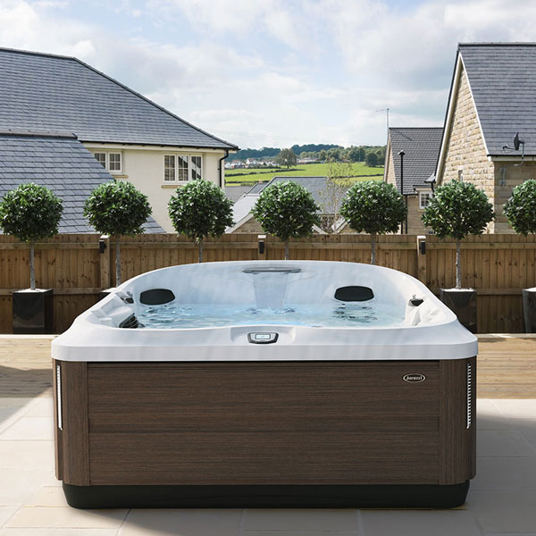Jacuzzi J-475™ large designer hot tub with lounge seat